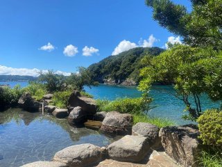 受入れ環境◎海辺にあるホテルで接客のお仕事です。海の見える露天風呂に入浴可能！